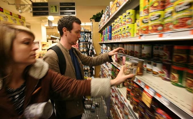 Ryan Watkins-Hughes, documentation photo of Shopdropping Project, NYC 2007. Via the NYTimes. 
